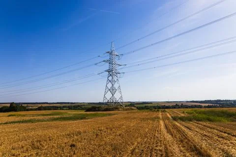 High voltage pole or High voltage electricity tower and transmission power lines Stock Photos