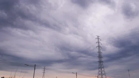 High voltage pole with sky cloud storm time lapse Stock Footage 136140623