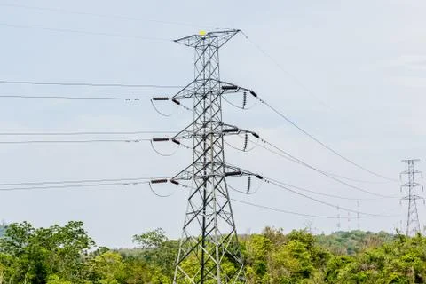 High voltage pole in valley Stock Photos