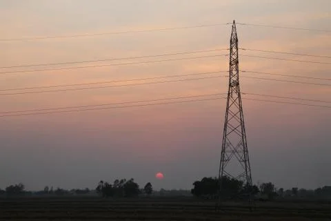 High voltage pole,High voltage tower with sky sunset background. Stock Photos