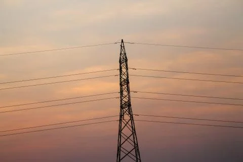 High voltage pole,High voltage tower with sky sunset background. Stock Photos