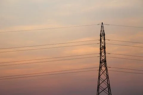 High voltage pole,High voltage tower with sky sunset background. Stock Photos