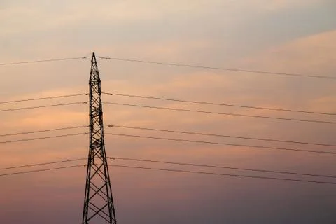 High voltage pole,High voltage tower with sky sunset background. Stock Photos