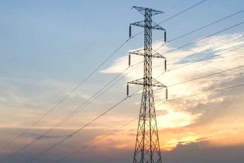 High Voltage Poles on the Evening for background Stock Photos