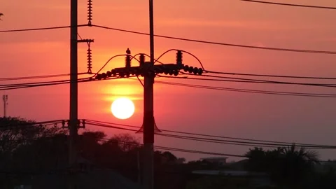 High voltage poles with sunset in the background Stock Footage 306653725