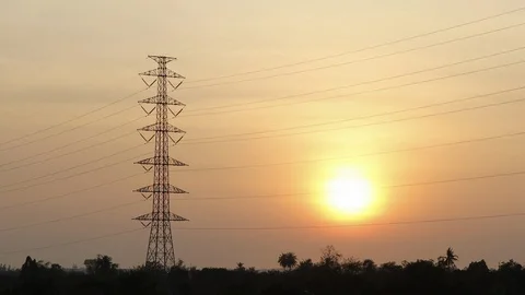 High Voltage Poles at sunset. Stock Footage 98129256