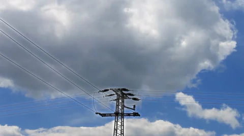 High Voltage Post against blue sky and clouds Stock Footage 38938497