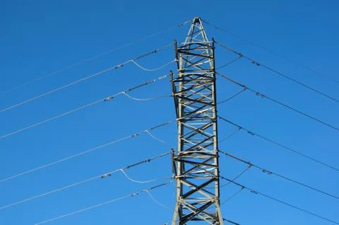 High voltage post. High-voltage tower sky background. Stock Photos