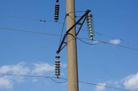 High voltage post. High-voltage tower sky background. Stock Photos