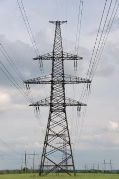 High voltage post. High-voltage tower sky background. Fotos de archivo