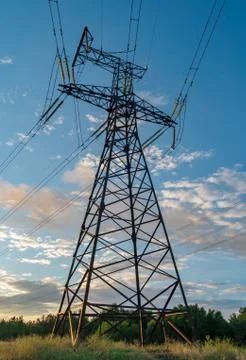 High voltage post. High-voltage tower sky background. Stock Photos