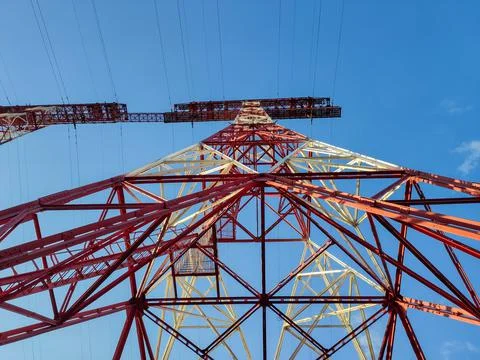 High voltage post. High-voltage tower sky background. Stock Photos