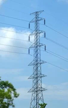 High voltage post or power transmission line tower and blue sky Stock Photos