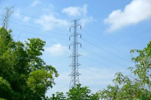High voltage post or power transmission line tower and blue sky Stock Photos
