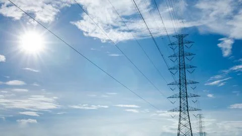High voltage post with the sun Stock Photos