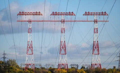 High voltage post. Tree High voltage towers. Group of transmission towers Photos