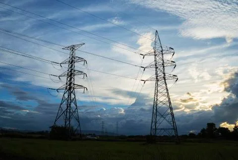 High voltage post,High voltage tower sky sunset background Фото