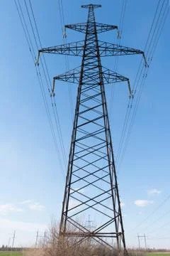 High voltage post.High-voltage tower sky background. Photos