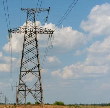 High voltage post.High-voltage tower sky background. 写真素材