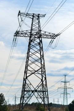 High voltage post.High-voltage tower sky background. Стоковые фото