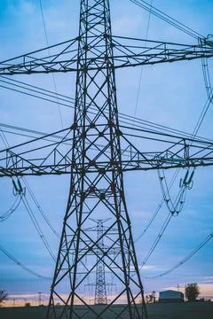 High voltage post,High voltage tower sky surise background Stock Photos