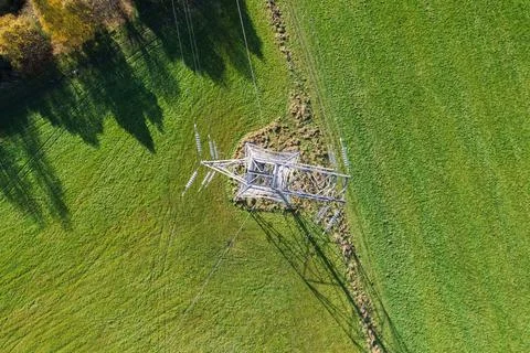 High voltage post,High voltage tower sky field grass housing esate aerial dro Stock Photos