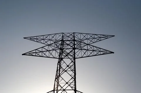High voltage post,High voltage tower on blue sky background. Stock Photos
