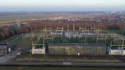 High Voltage Power Grid Infrastructure Netherlands Aerial Video stock 331403233