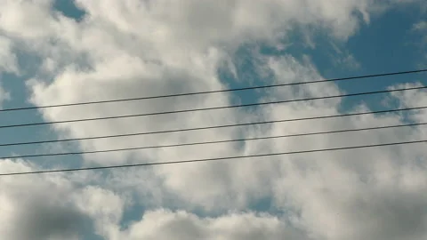 High Voltage Power Line On The Cloudy Blue Sky Timelapse. 스톡 동영상 134605686
