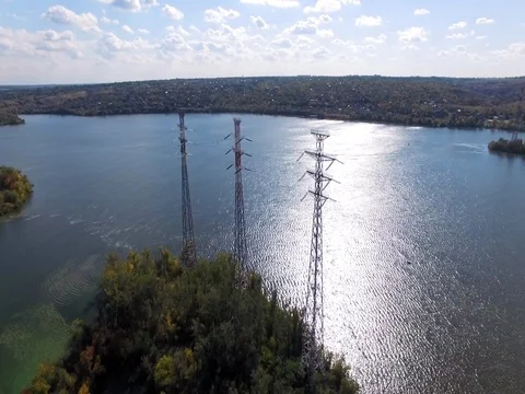 High-voltage power line. electricity supply across the river. Video stock 83183545