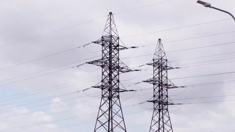 High voltage power line pylons and electricity grid transmission in Daugavpils Stock Footage 344355215