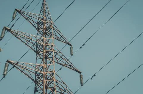 High-voltage power line support. Providing cities with electricity. Close-up Stock Photos