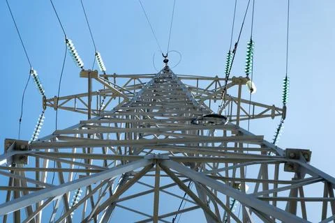 High-voltage power line support against the blue sky Fotos Stock