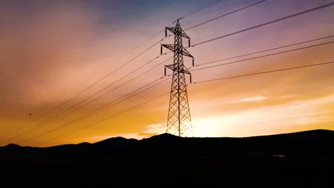 High Voltage Power Line Tower Timelapse Sunset View Stock Footage 339169548