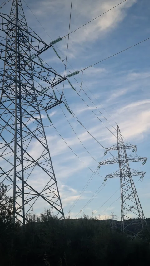 High Voltage Power Line Transmission Tower in Rural Countryside Stock Footage 343817598