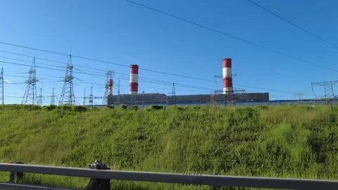 High voltage power lines against the blue sky Stock Footage 229852699