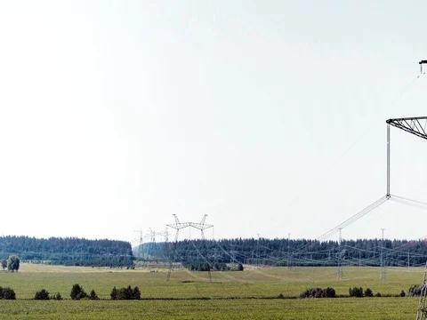 High voltage power lines and pylons Stock Footage 81074068