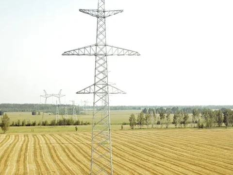 High voltage power lines and pylons Stock Footage 81077942