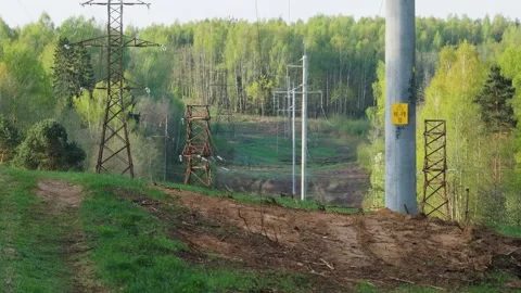 High Voltage Power Lines. Concept of electricity and energy generation, aerial Stock-Footage 307311647