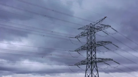 High voltage power lines leading to transmission tower Stock Footage 327707369