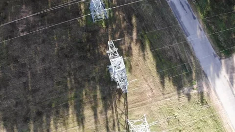High-voltage power lines in the middle of the day Stock Footage 141525844