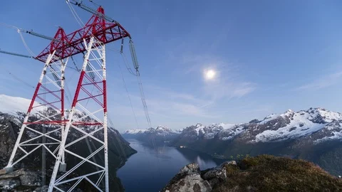 High voltage power lines with moon Stock Footage 122944670