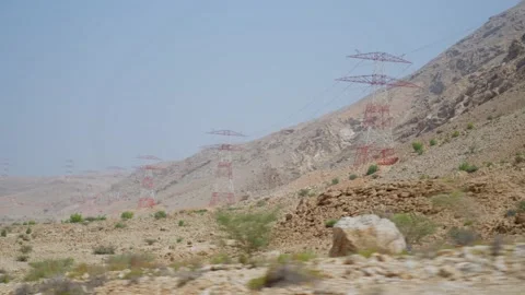 High Voltage Power Lines on the Mountains, Muscat, Oman Stock Footage 196003241