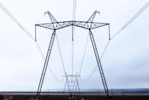 High voltage power lines in perspective Foto stock