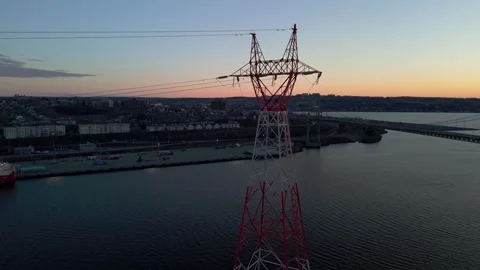 High voltage power lines at sunset,high voltage electric transmission tower Stock Footage 276625283