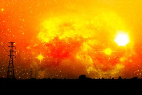 High voltage power pole middle of a cornfield with orange sky and galaxy Stock Photos