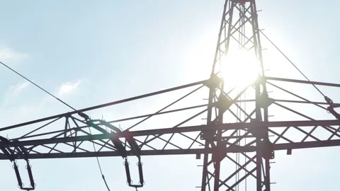 High voltage power pylons close up on against the sun. Silhouette Stock Footage 86218680