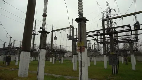 High voltage power station. Wide angle, high voltage substation with tall pylons Stock Footage 165243790