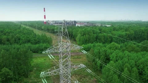 High-voltage power transmission lines tower on a dirty coal-fired, carbon Stock Footage 159397259