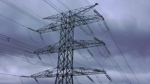 High voltage power transmission tower and electrical infrastructure Stock Footage 327453377
